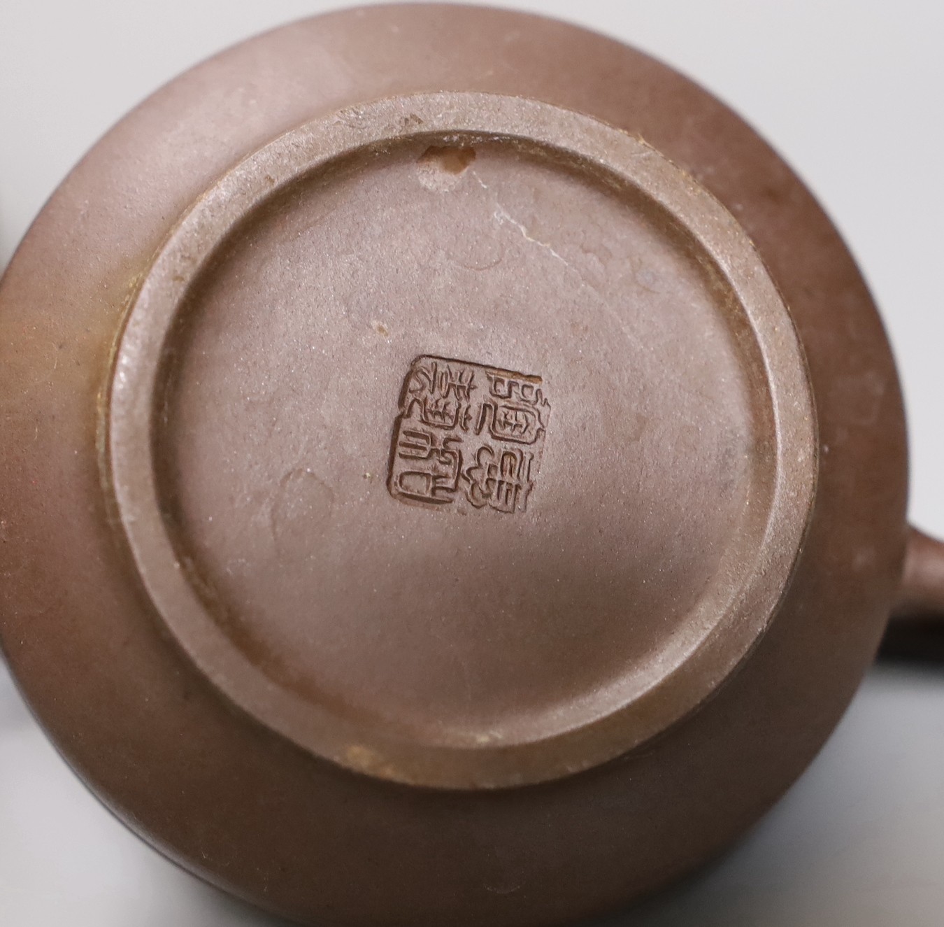 A Chinese Yixing rectangular teapot and three other Yixing teapots (4), Tallest 12 cms high